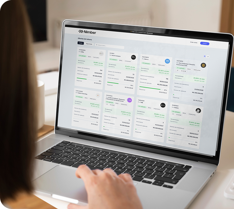Plataforma Nimber exibindo ofertas de tokens em um notebook